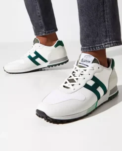 Beżowe sneakersy z zielonym logo