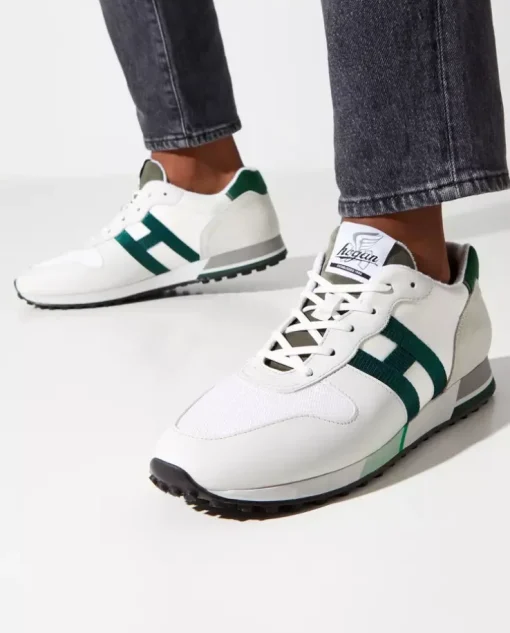 Beżowe sneakersy z zielonym logo