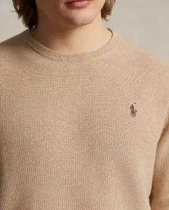 Beżowy bawełniany sweter z logo