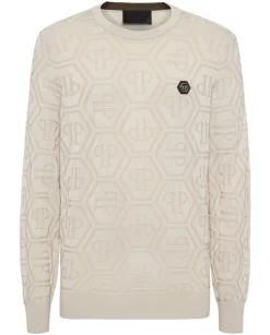 Beżowy sweter z monogramem