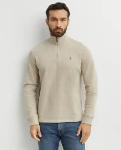 Beżowy sweter z suwakiem i logo