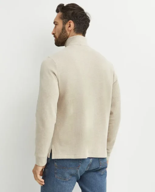 Beżowy sweter z suwakiem i logo
