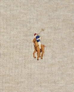 Beżowy sweter z suwakiem i logo
