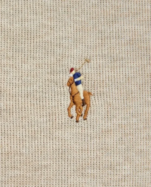 Beżowy sweter z suwakiem i logo