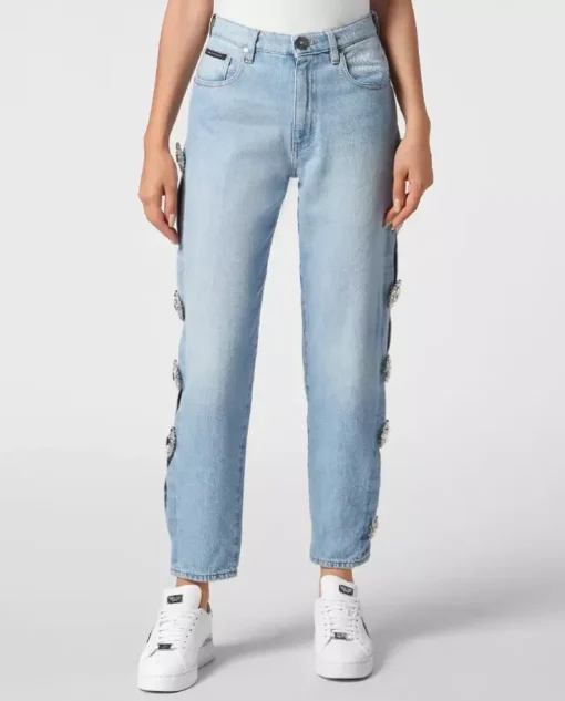 Jasnoniebieskie jeansy z wycięciami