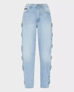 Jasnoniebieskie jeansy z wycięciami