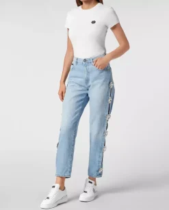 Jasnoniebieskie jeansy z wycięciami