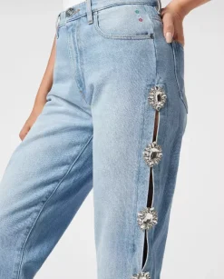Jasnoniebieskie jeansy z wycięciami