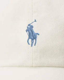 Kremowa czapka z daszkiem i logo