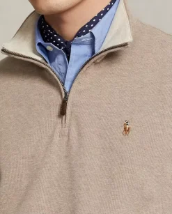 Kremowy sweter z suwakiem i logo