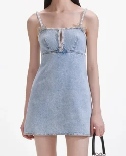 Niebieska jeansowa sukienka mini