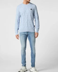 Niebieski sweter z monogramem