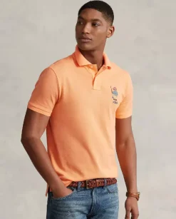 Pomarańczowy t-shirt polo z misiem