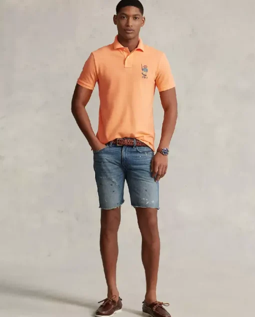 Pomarańczowy t-shirt polo z misiem