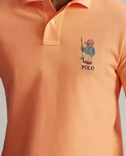 Pomarańczowy t-shirt polo z misiem