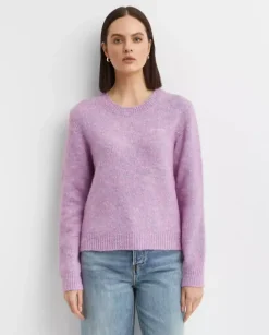 Różowy melanżowy sweter