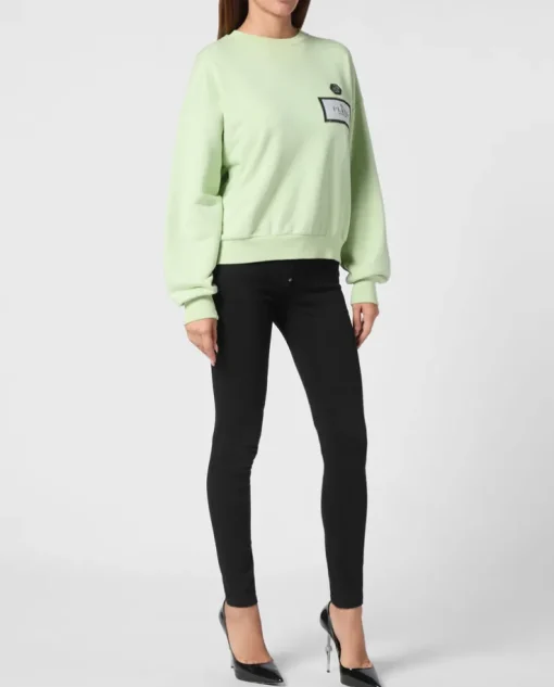 Zielona bluza z naszywką z logo